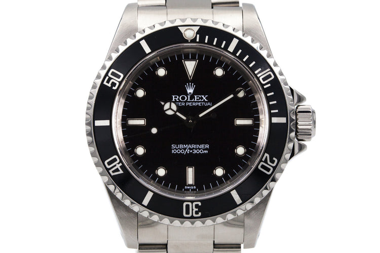 1999 Rolex Submariner 14060 with uncommon SWISS only dial