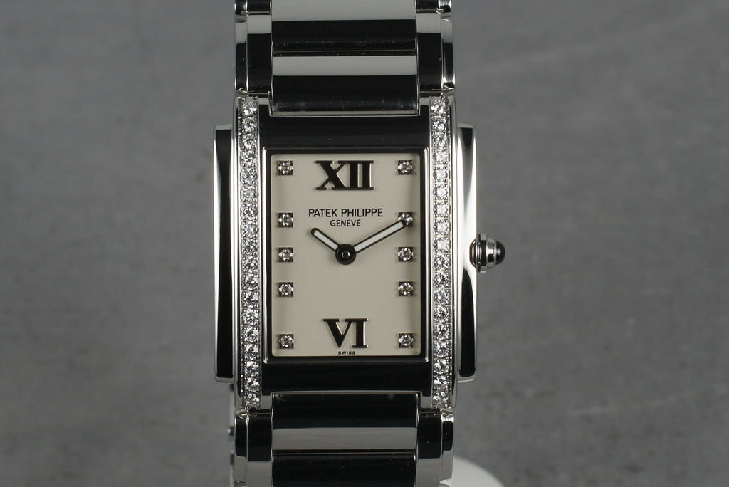 Patek Philippe Ladies 24 with Diamonds and Box and Papers