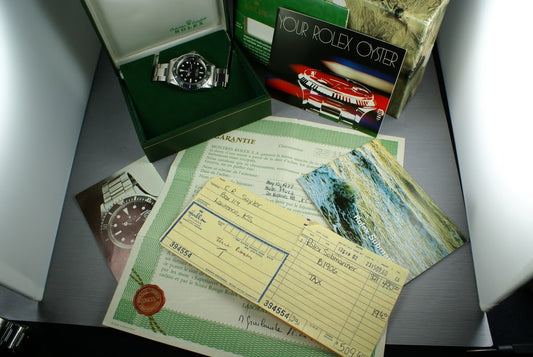 Rolex Red Submariner 1680 with Box, Papers, and Advertising material