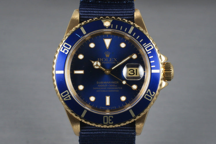 1991 Rolex 18K Blue Submariner 16618 with Box and Papers