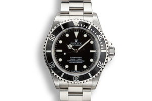 2006 Rolex Four Line Submariner 14060M with Box and Papers
