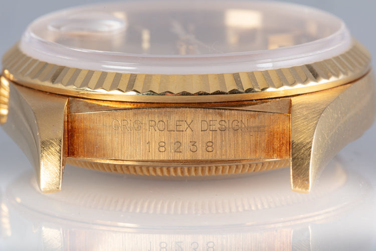 1995 Rolex Day-Date 18238 Champagne Stick Dial with Roman Numeral Track Ring & Papers