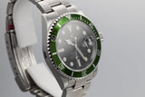 Mint with Stickers 2007 Rolex Anniversary Green Submariner 16610V with Box and Papers