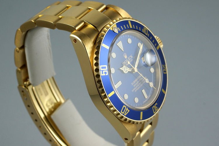 1985 Rolex YG Blue Submariner 16808 with Box and Papers
