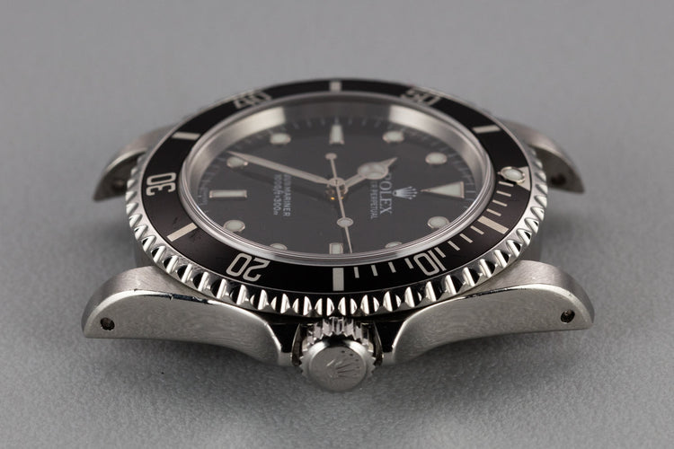 1999 Rolex  Submariner 14060 with SWISS Only Dial