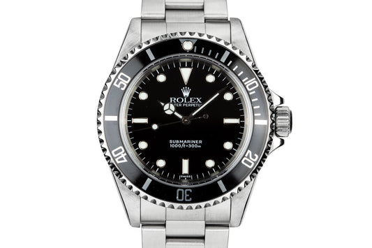 1999 Rolex Submariner 14060 "SWISS Only Dial" with Box and Papers