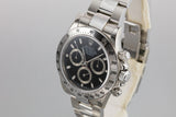 2003 Rolex Daytona 116520 Black Dial Still In Factory Protective Stickers with Box and Papers