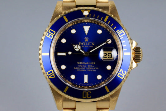 2006 Rolex YG Blue Submariner 16618 with Box and Papers