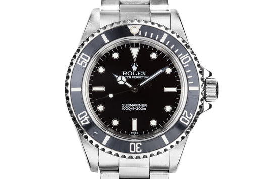 1998 Rolex Submariner 14060 with "SWISS" Only Dial