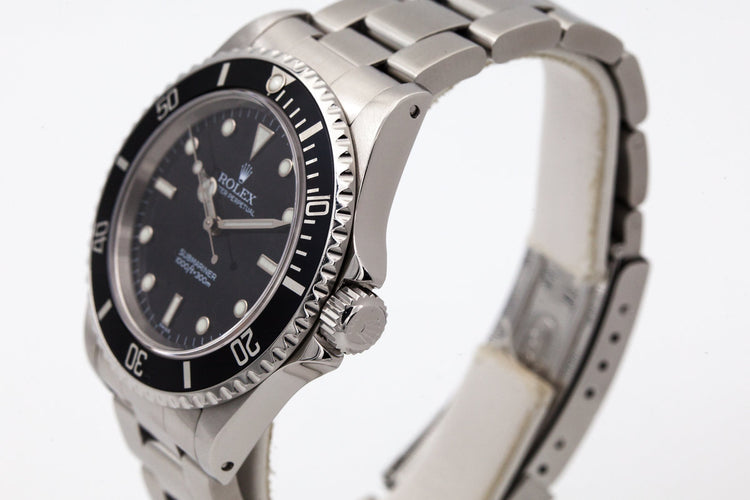 1999 Rolex Submariner 14060 with uncommon SWISS only dial