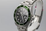 Mint with Stickers 2007 Rolex Anniversary Green Submariner 16610V with Box and Papers