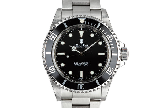 1999 Rolex Submariner 14060 with SWISS Only Dial