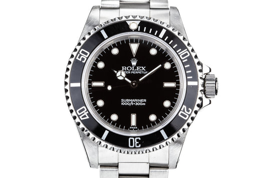 1999 Rolex Submariner 14060  with SWISS Only Dial