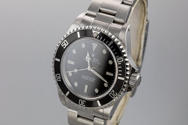 1999 Rolex Submariner 14060 SWISS Only Dial