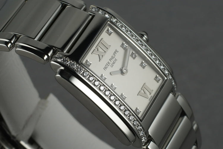 Patek Philippe Ladies 24 with Diamonds and Box and Papers