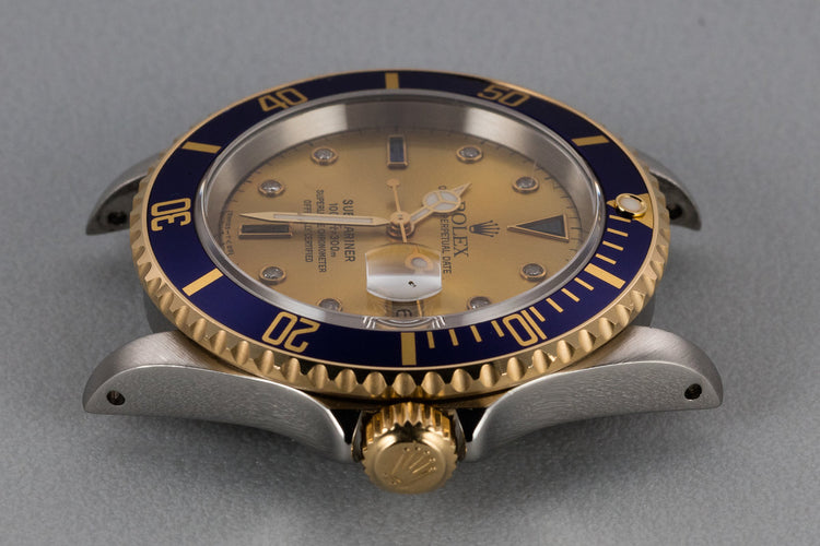 1995 Rolex Two-Tone Submariner 16613 with Champagne Serti Dial
