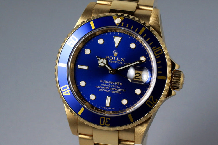 2006 Rolex YG Blue Submariner 16618 with Box and Papers