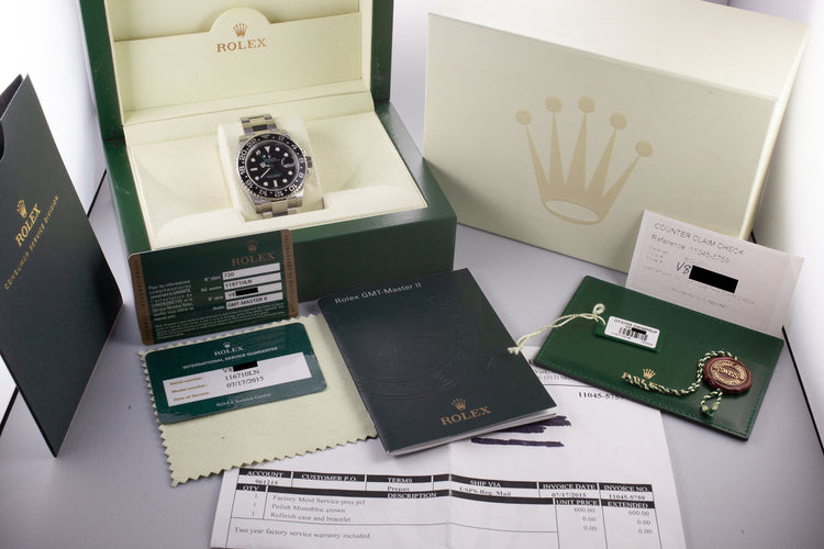 2009 Rolex GMT-Master II 16710LN Black Bezel with Box, Papers, and Service Papers
