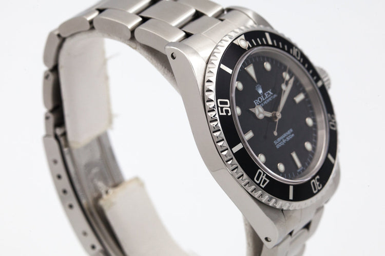 1999 Rolex Submariner 14060 with uncommon SWISS only dial