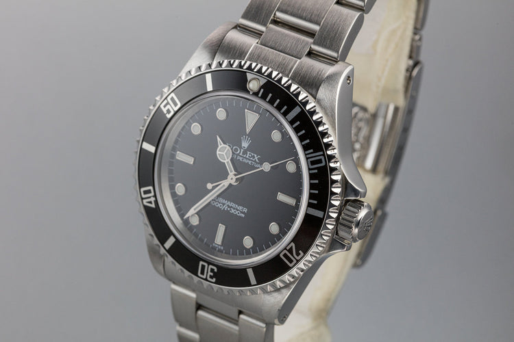 1999 Rolex Submariner 14060 with SWISS Only Dial with Box and Papers