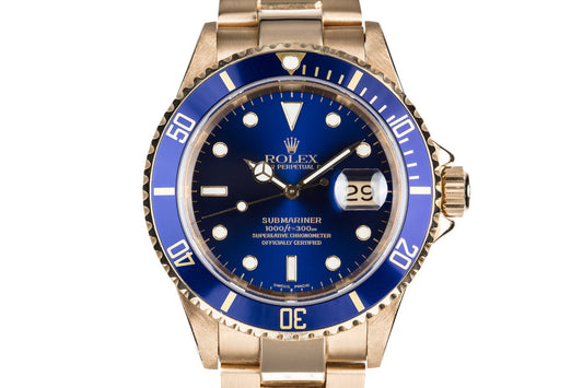 1990 Rolex 18K Submariner 16618 Blue Dial with Service Papers