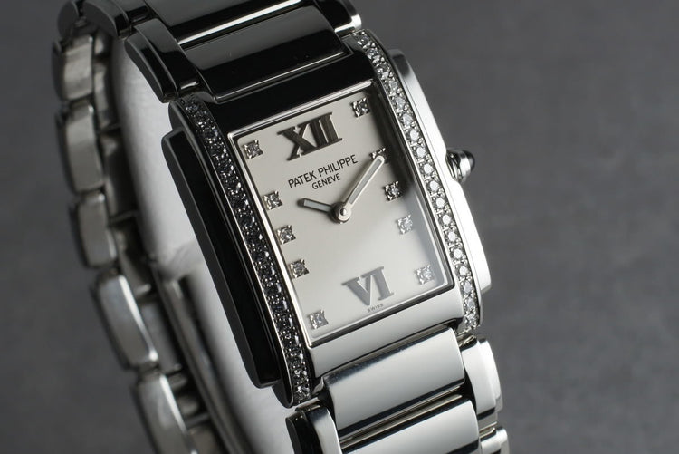 Patek Philippe Ladies 24 with Diamonds and Box and Papers