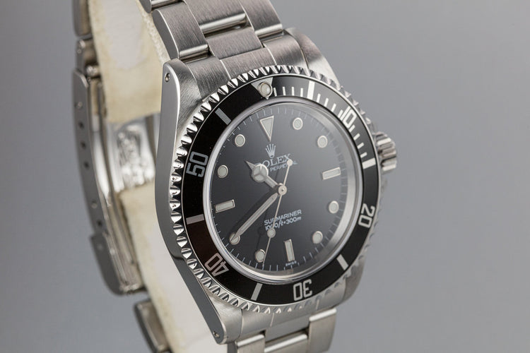 1999 Rolex Submariner 14060 with SWISS Only Dial with Box and Papers
