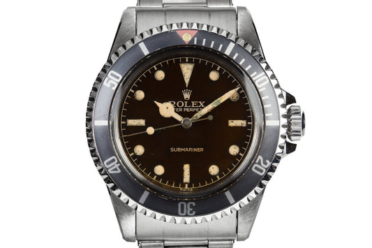 1959 Rolex Submariner 5512 with Tropical Gilt Chapter Ring Dial, Red Triangle Bezel, and Big Logo Stretch Bracelet