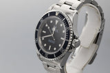 1995 Rolex Submariner 14060 with Faded bezel insert.