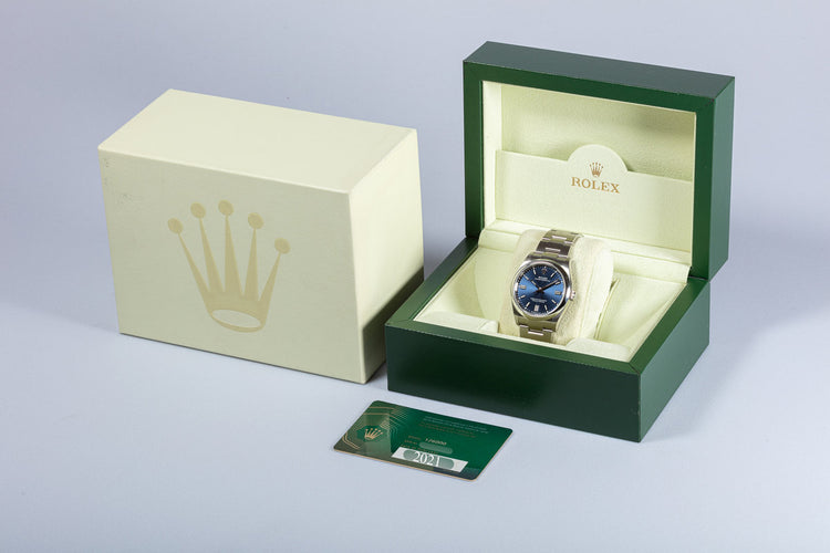 2021 36mm Rolex Oyster Perpetual 126000 Bright Metallic Blue Dial Box & Card