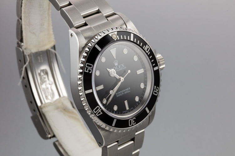 1995 Rolex Submariner 14060 with Service Papers