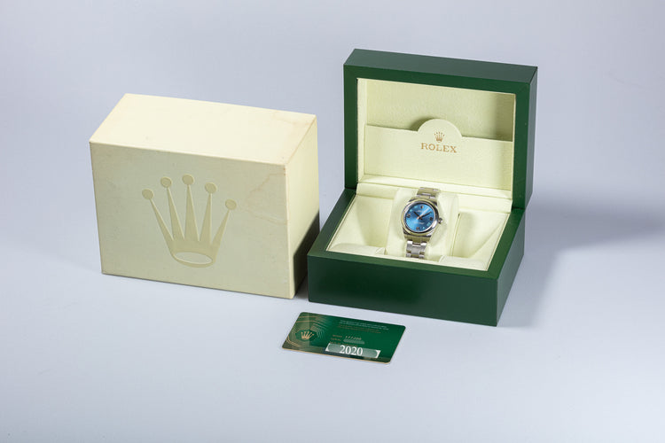 2020 Rolex Oyster Perpetual 126000 31mm Bright Metallic Blue Dial Box & Card