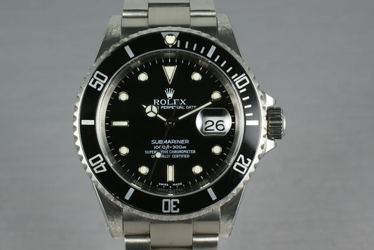 Rolex Submariner 16610 with box and papers K serial