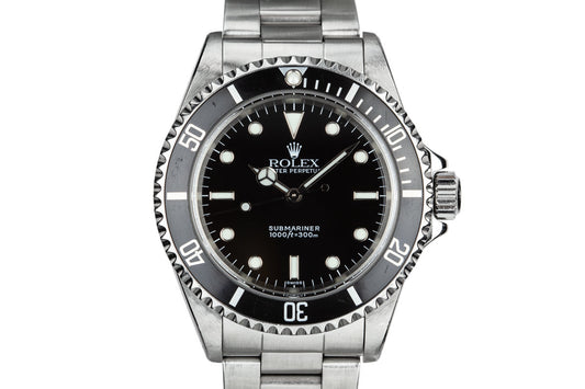 1999 Rolex  Submariner 14060 with SWISS Only Dial