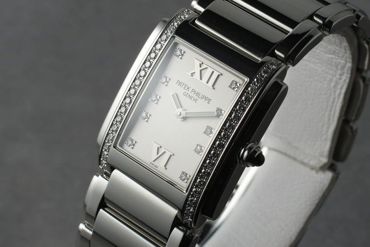 Patek Philippe Ladies 24 with Diamonds and Box and Papers